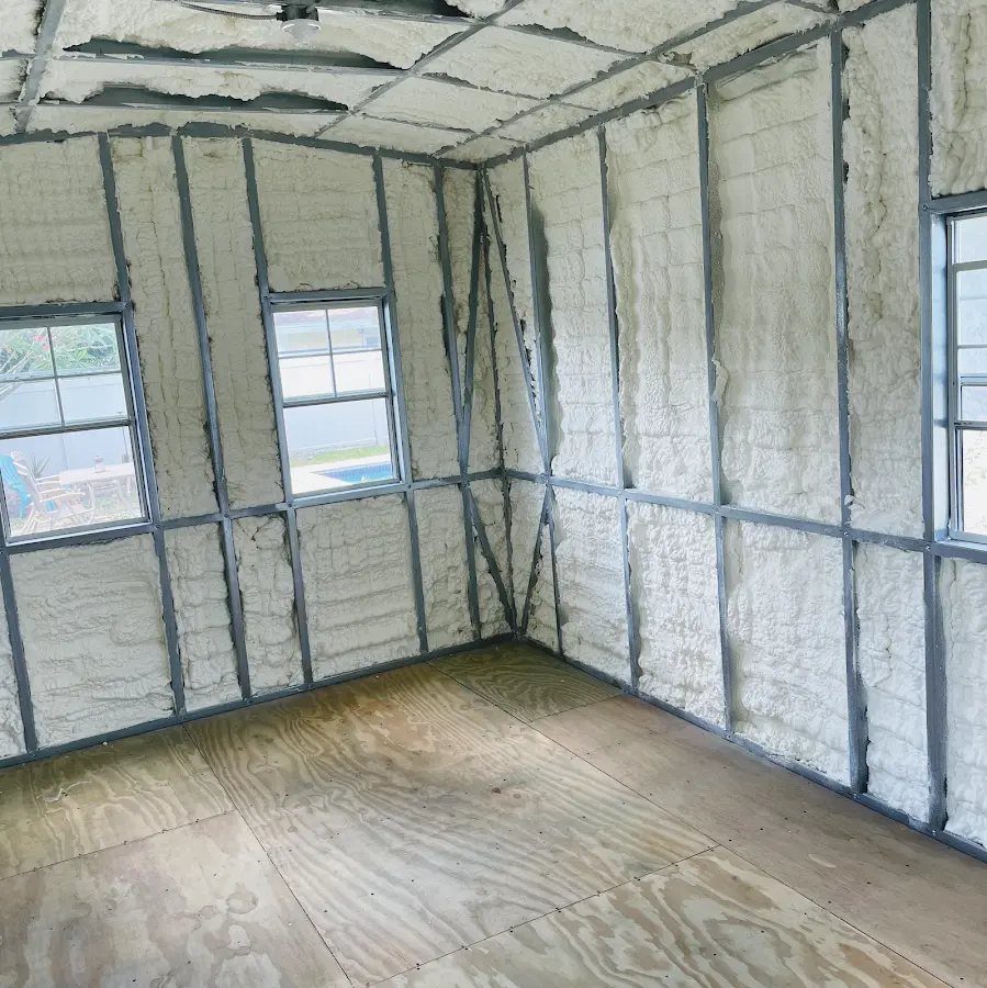 Closed-cell spray foam insulation applied to wall cavities in a residential project in Hillcrest